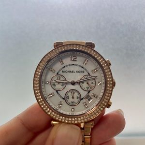 Michael Kors rose gold watch.